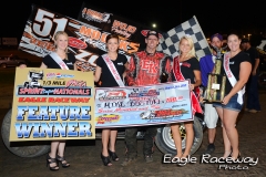 eagle-08-31-13-520-mike-boston-with-2012-miss-nebraska-cup-courtney-wulf-and-2013-miss-nebraska-cup-finalist-and-the-eagle-flagman-billy-lloyd